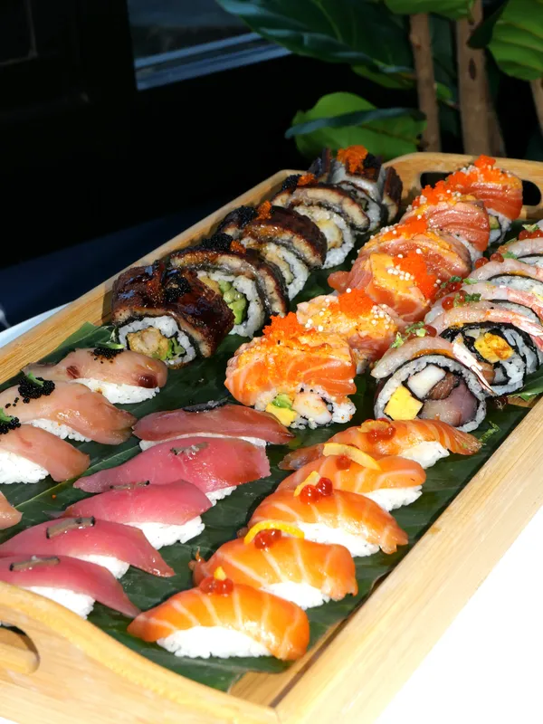 Party tray of hand-cut nigiri and specialty rolls